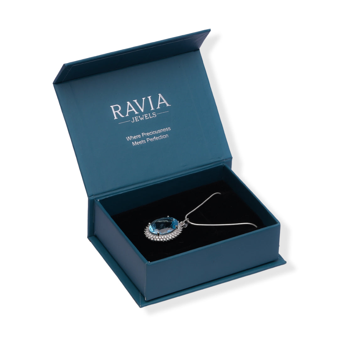 Pakistani Oval Blue Topaz and Zircon Pendant - Timeless Elegance, Ethereal Beauty
