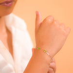 Load image into Gallery viewer, Graceful Women's Bangle with Oval Peridot Gemstones - Handcrafted Elegance from Pakistan