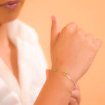 Load image into Gallery viewer, Graceful Women&#39;s Bangle with Oval Peridot Gemstones - Handcrafted Elegance from Pakistan
