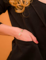 Load image into Gallery viewer, Exquisite Women's Bangle with Oval Peridot and Zircon Gemstones - Handcrafted Elegance from Pakistan