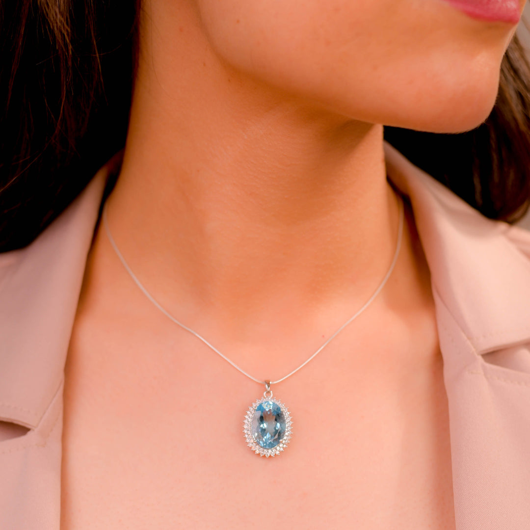 Pakistani Oval Blue Topaz and Zircon Pendant - Timeless Elegance, Ethereal Beauty