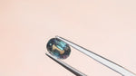 Load and play video in Gallery viewer, Teal Blue Sapphire - 0.98 ct, Oval Cut
