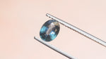 Load and play video in Gallery viewer, Blue Sapphire from Sri Lanka - 1.34 ct, Oval Faceted Cut
