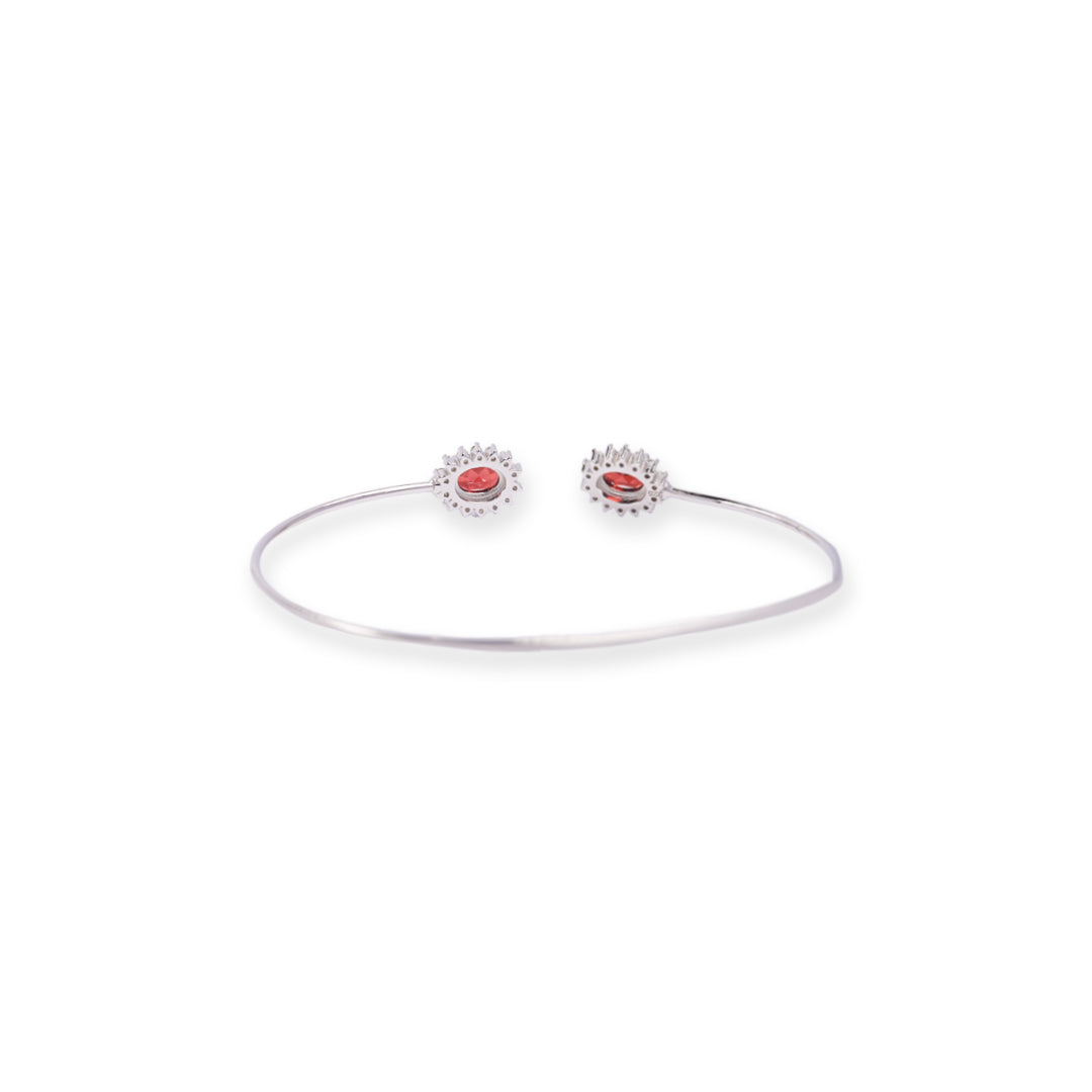 Oval Garnet and Zircon Bangle – African Craftsmanship, Subtle Elegance