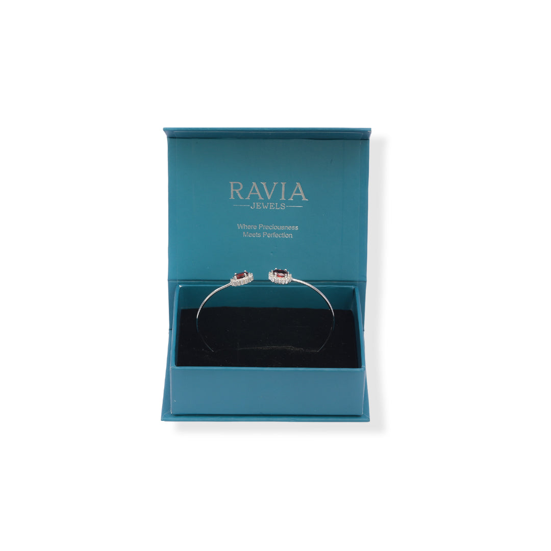 Oval Garnet and Zircon Bangle – African Craftsmanship, Subtle Elegance