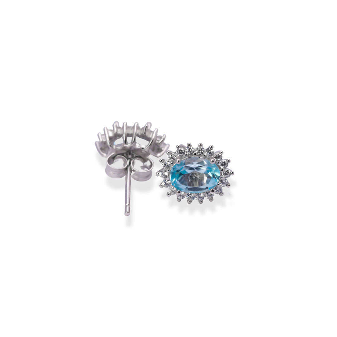 Elegant Oval Blue Topaz and Zircon Women's Earrings from Pakistan - Timeless Beauty in Every Stud
