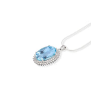 Pakistani Oval Blue Topaz and Zircon Pendant - Timeless Elegance, Ethereal Beauty