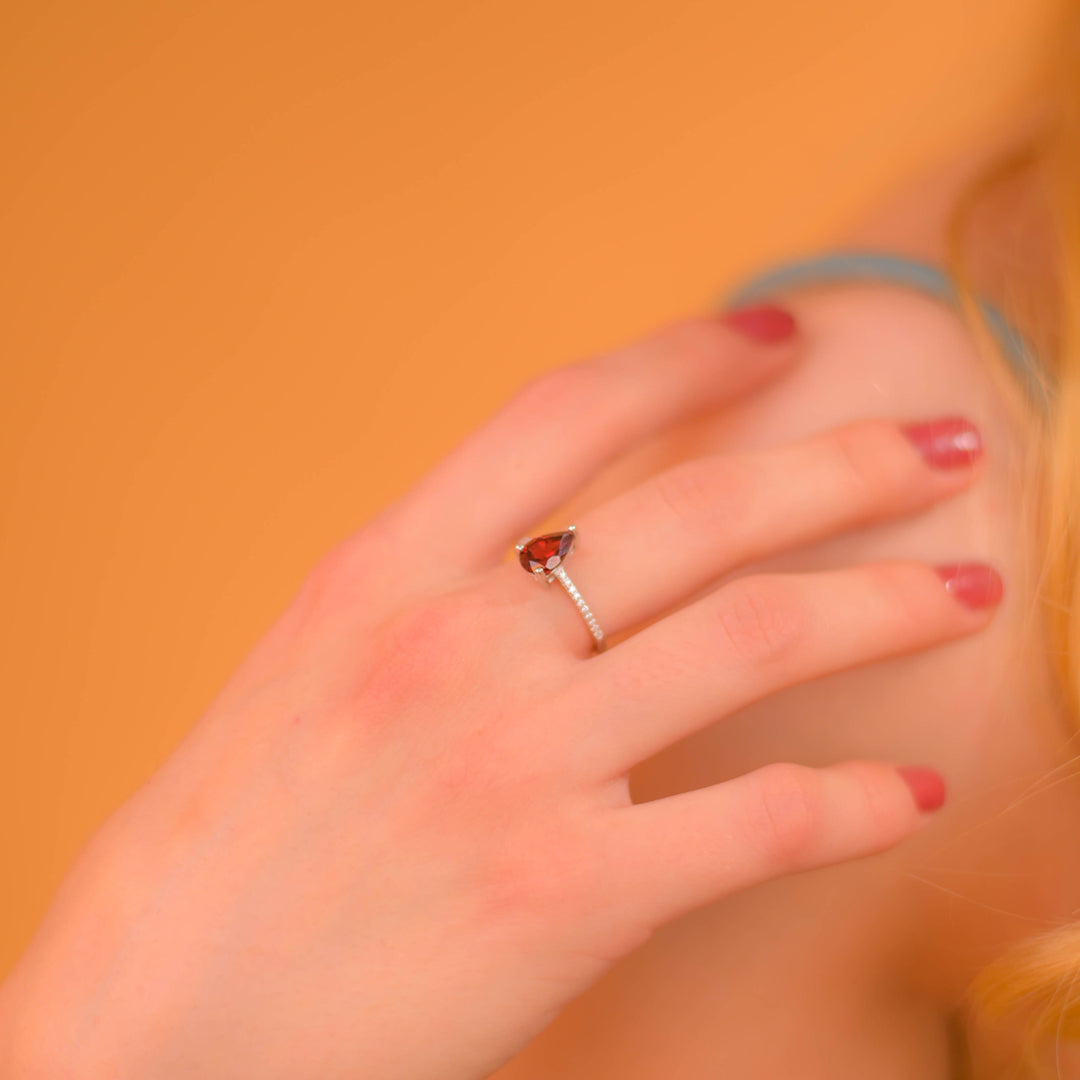 Elegant Pear-shaped African Garnet Ring - Radiate Charm and Grace