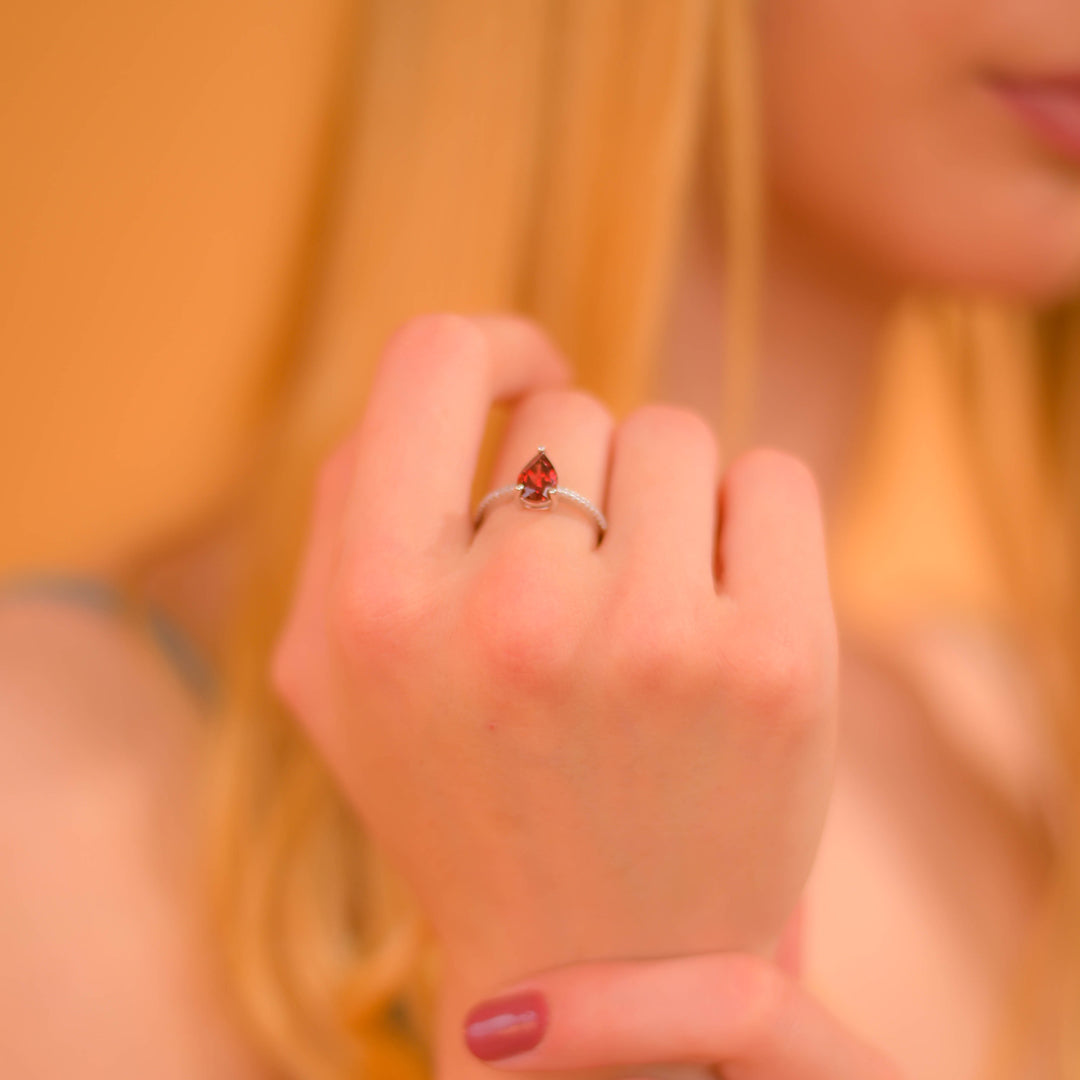 Elegant Pear-shaped African Garnet Ring - Radiate Charm and Grace